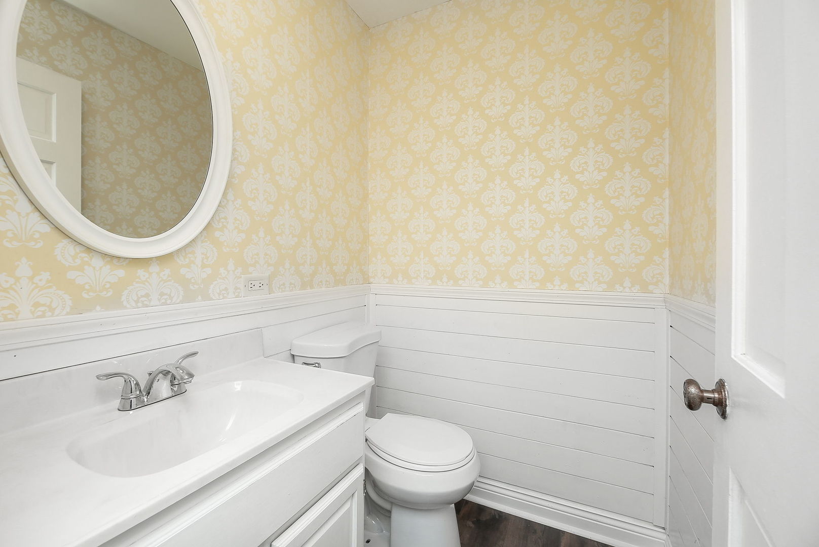 31W137 Rohrssen Road Hoffman Estates, IL 60192 - Photo 14 of 43 a bathroom with a sink and a toilet