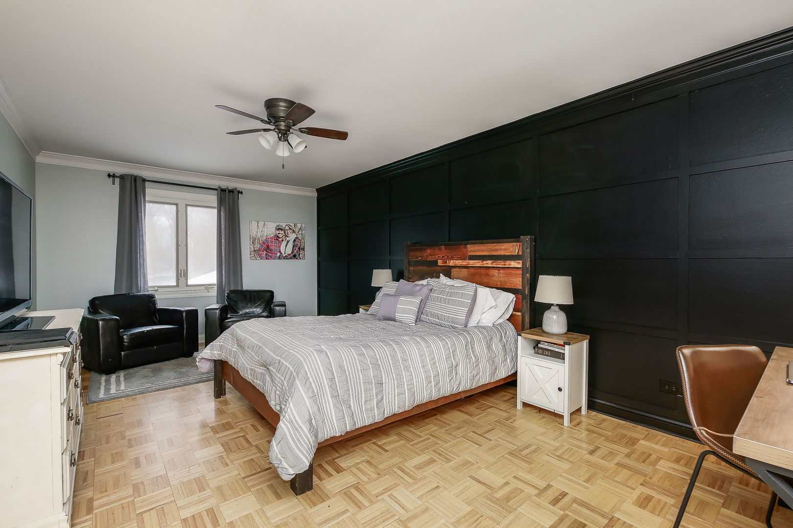 31W137 Rohrssen Road Hoffman Estates, IL 60192 - Photo 15 of 43 a bedroom with a bed and chair