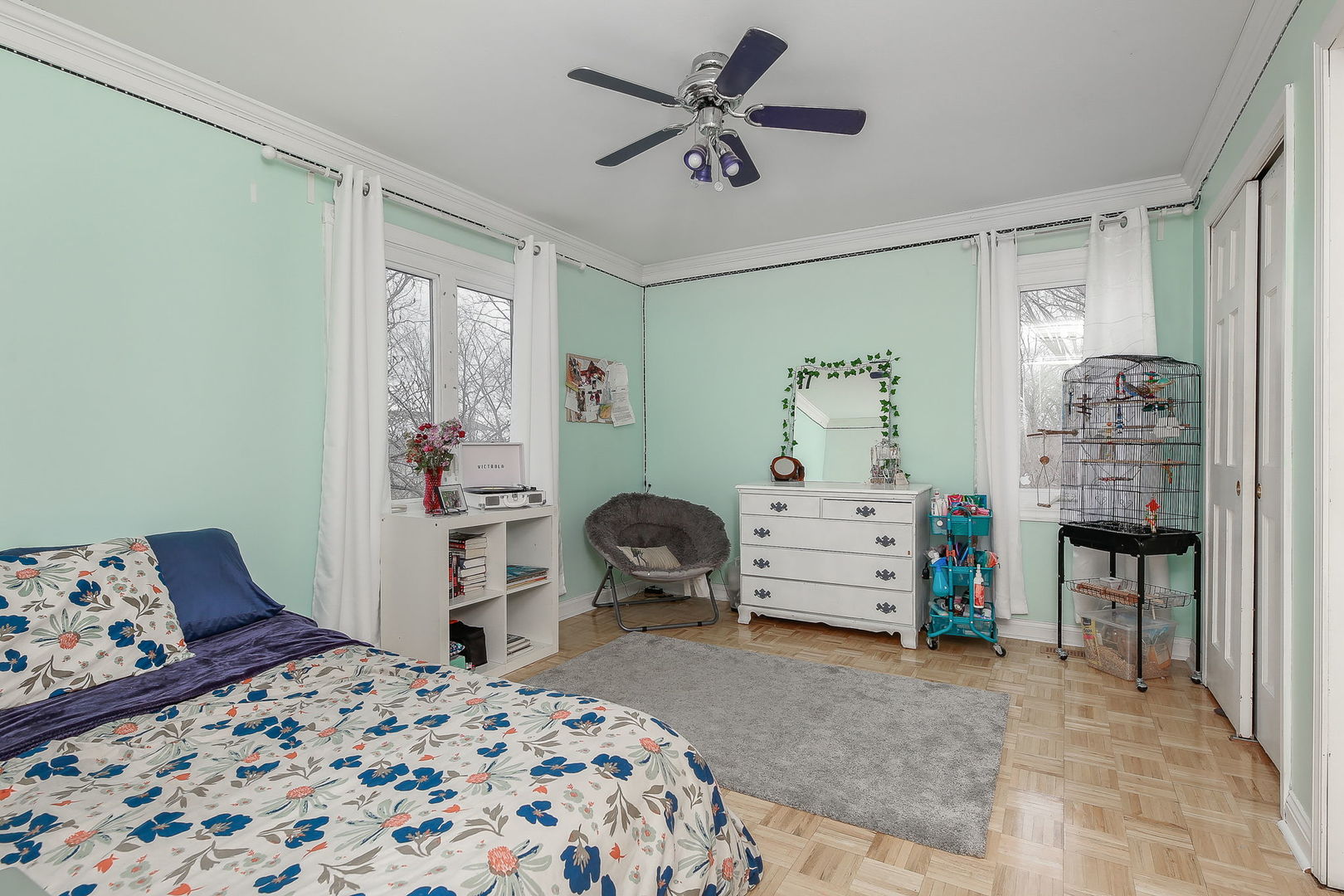 31W137 Rohrssen Road Hoffman Estates, IL 60192 - Photo 18 of 43 a bedroom with a bed and a chair