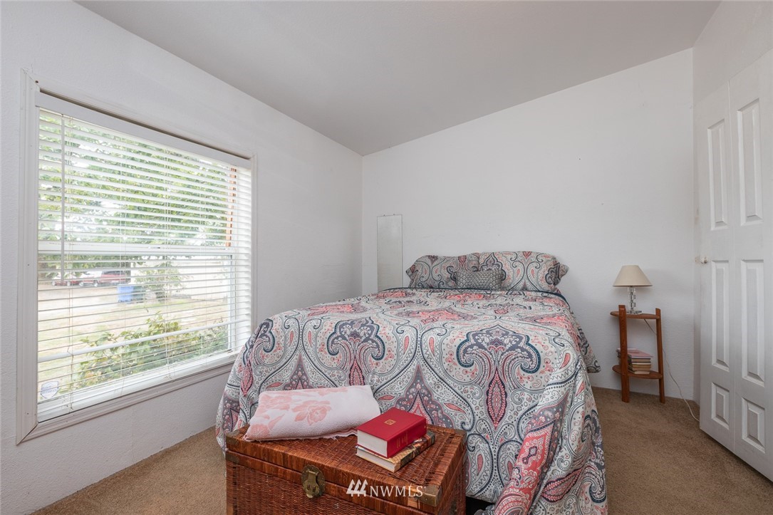 2011 Bishop Road Chehalis, WA 98532 - Photo 12 of 25 a bedroom with a bed and a window