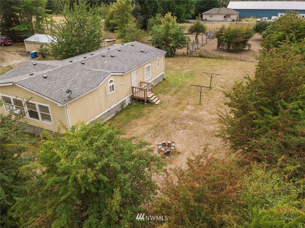 2011 Bishop Road Chehalis, WA 98532 - Photo 16 of 25 a aerial view of a house with a yard and garage
