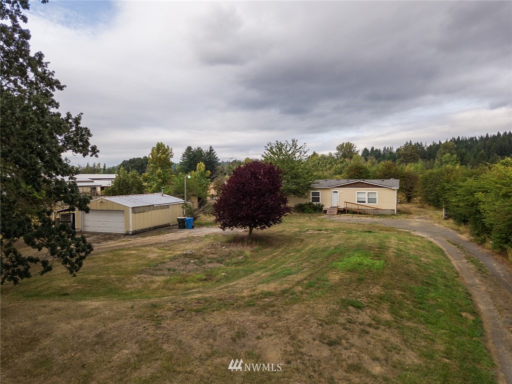 2011 Bishop Road Chehalis, WA 98532 - Photo 19 of 25 a car parked in the middle of a field