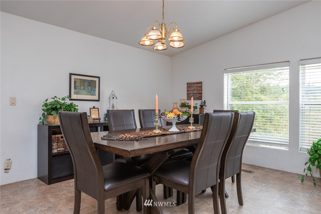 2011 Bishop Road Chehalis, WA 98532 - Photo 3 of 25 a view of a dining room with furniture window and outside view