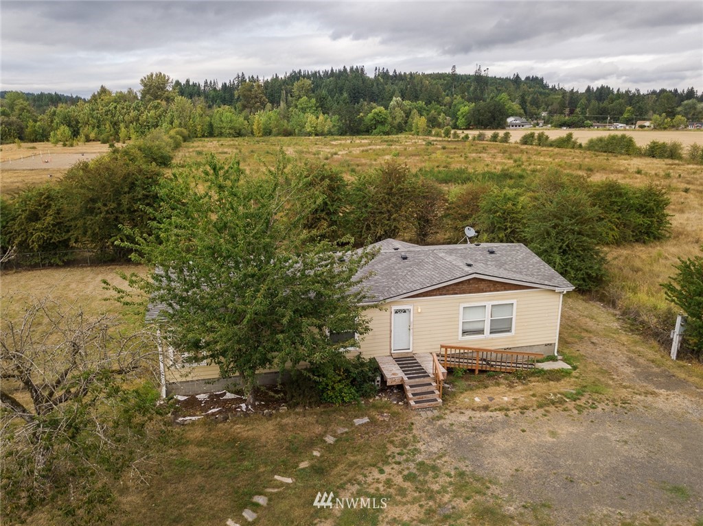 2011 Bishop Road Chehalis, WA 98532 - Photo 21 of 25 a aerial view of a house with a yard and lake view