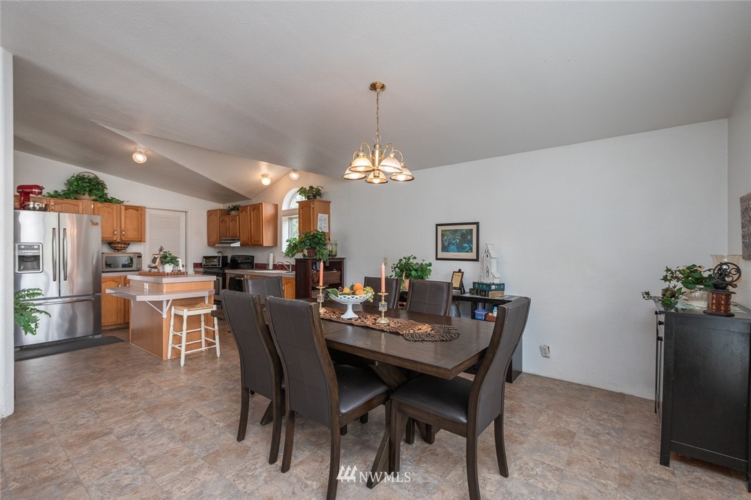 2011 Bishop Road Chehalis, WA 98532 - Photo 5 of 25 a view of a dining room with furniture and chandelier