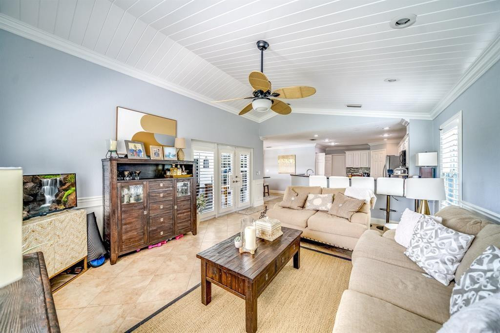 12036 Quilting Lane Boca Raton, FL 33428 - Photo 13 of 25 a living room with furniture and a flat screen tv
