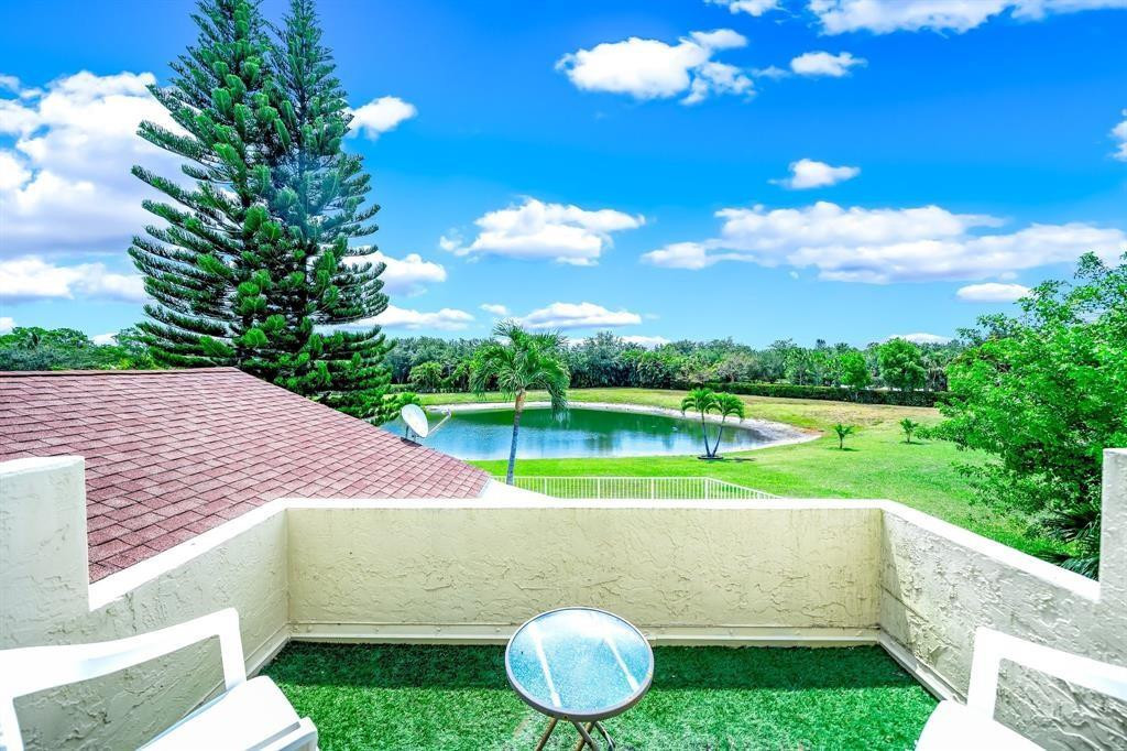 12036 Quilting Lane Boca Raton, FL 33428 - Photo 20 of 25 a view of yard with swimming pool and green space