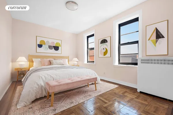 a bedroom with bed and window