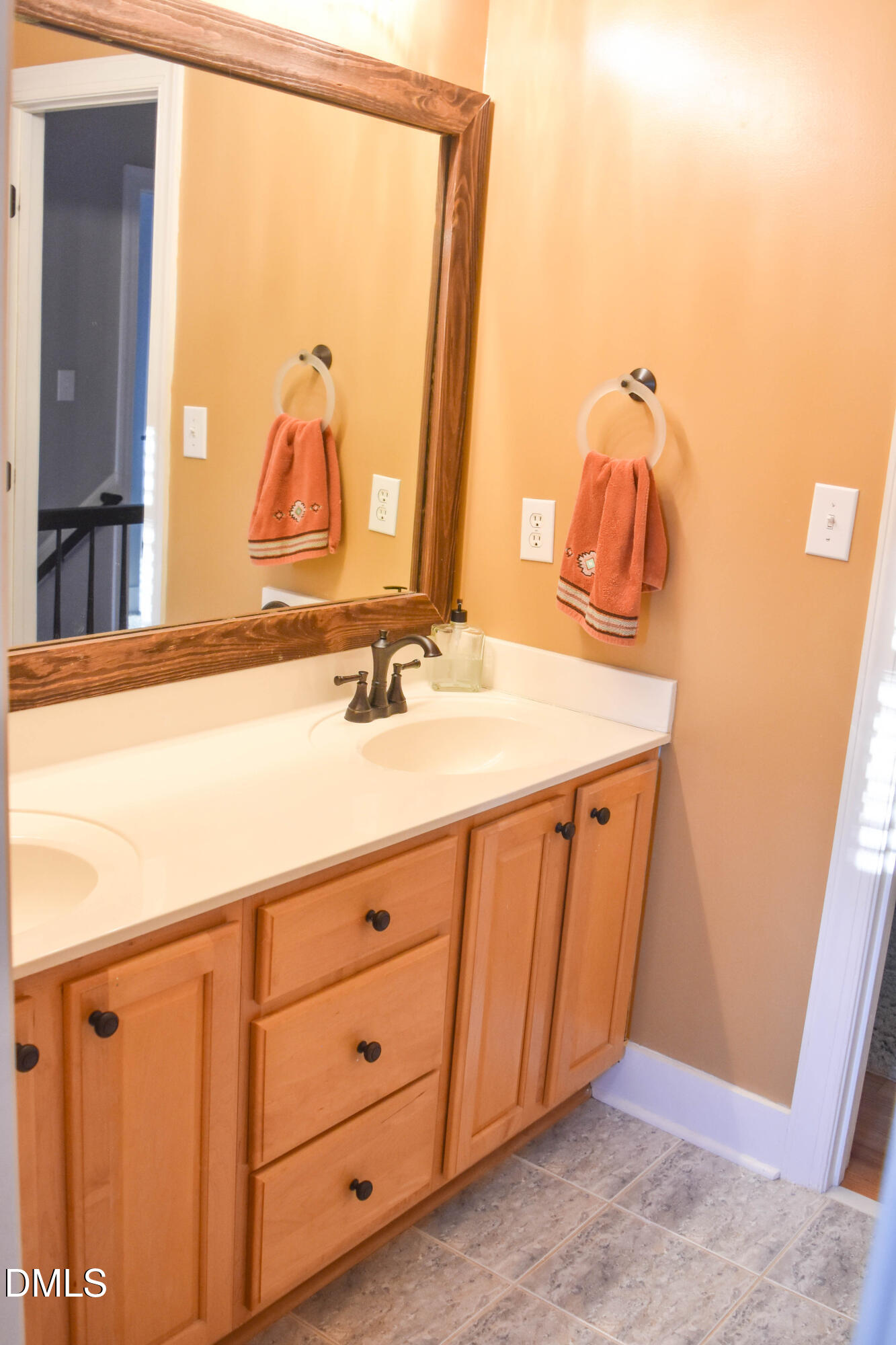 5908 Deep Spring Circle Wake Forest, NC 27587 - Photo 31 of 51 a bathroom with a sink and a mirror