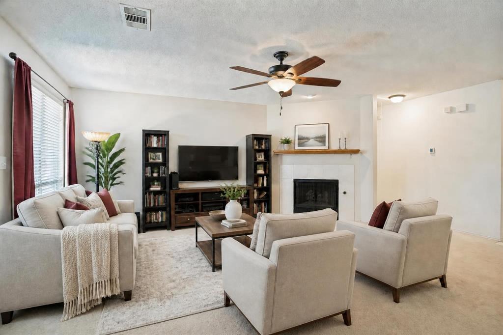 1411 Dearborn Road Allen, TX 75002 - Photo 4 of 28 This living room is both spacious and cozy. Great for entertaining! Virtually staged living room