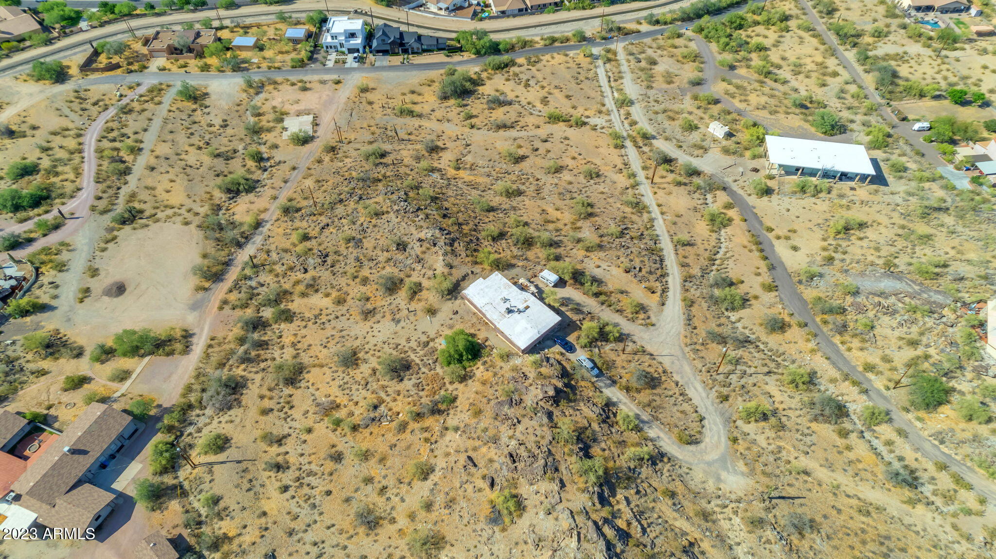 3425 East Highline Canal Road Phoenix, AZ 85042 - Photo 5 of 16 a bathroom with a shower curtain