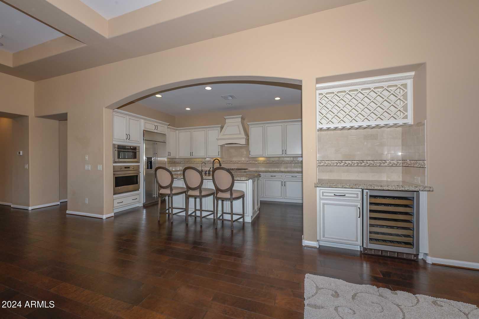 16760 West Berkeley Road Goodyear, AZ 85395 - Photo 16 of 49 Kitchen-Wine Fridge