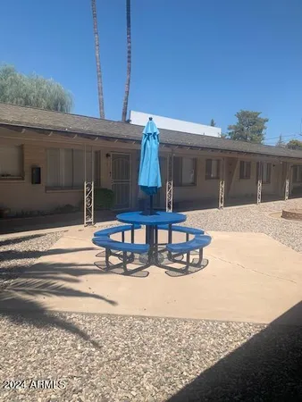 a view of a swimming pool with a chair