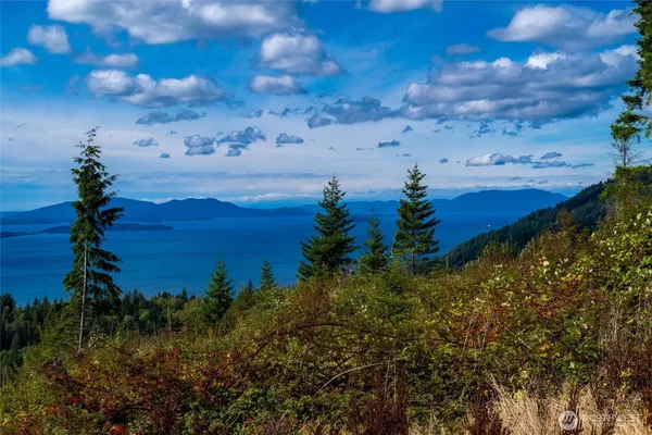 a view of mountain with lake view