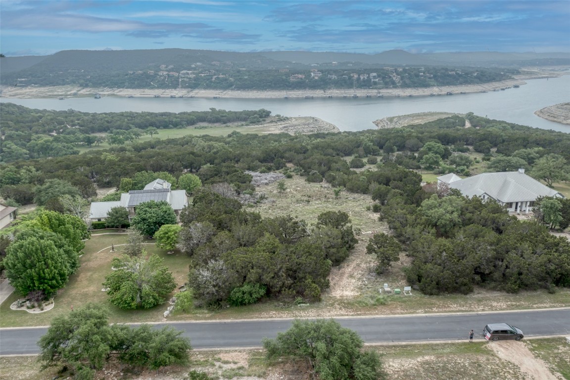 8111 Moon Rise Trail Jonestown, TX 78645 - Photo 2 of 12 a view of a lake with a mountain