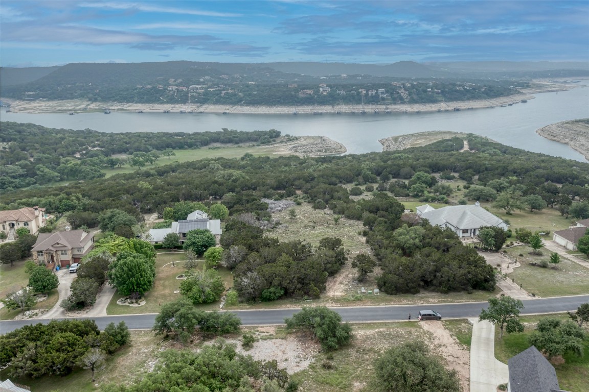 8111 Moon Rise Trail Jonestown, TX 78645 - Photo 3 of 12 a view of a lake with a mountain