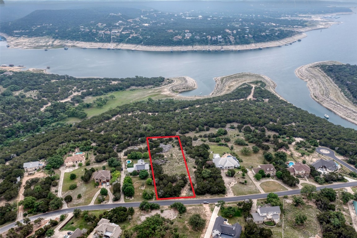 8111 Moon Rise Trail Jonestown, TX 78645 - Photo 5 of 12 an aerial view of a houses with yard