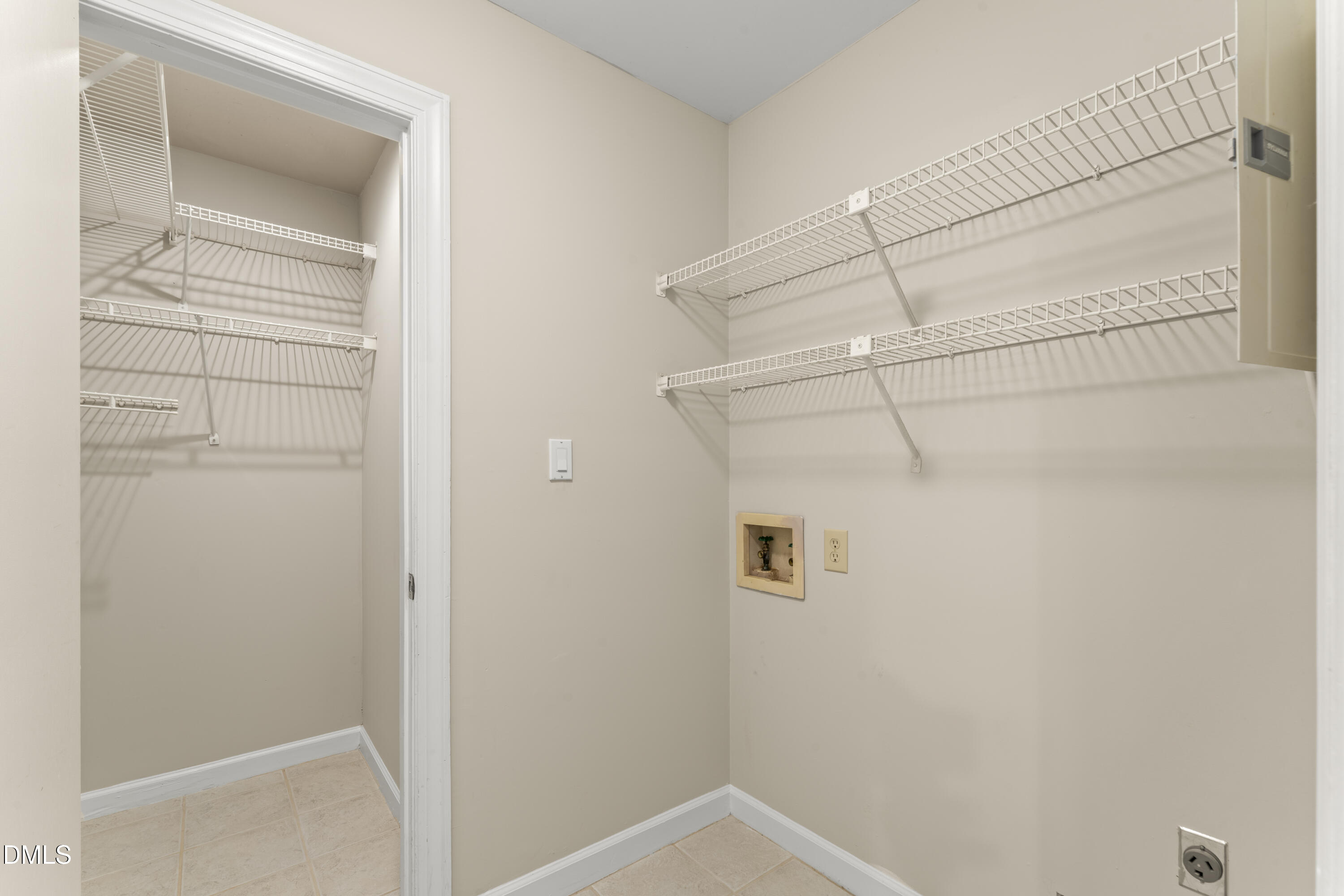 5405 Millrace Trail Raleigh, NC 27606 - Photo 21 of 45 Laundry Room + Storage Closet