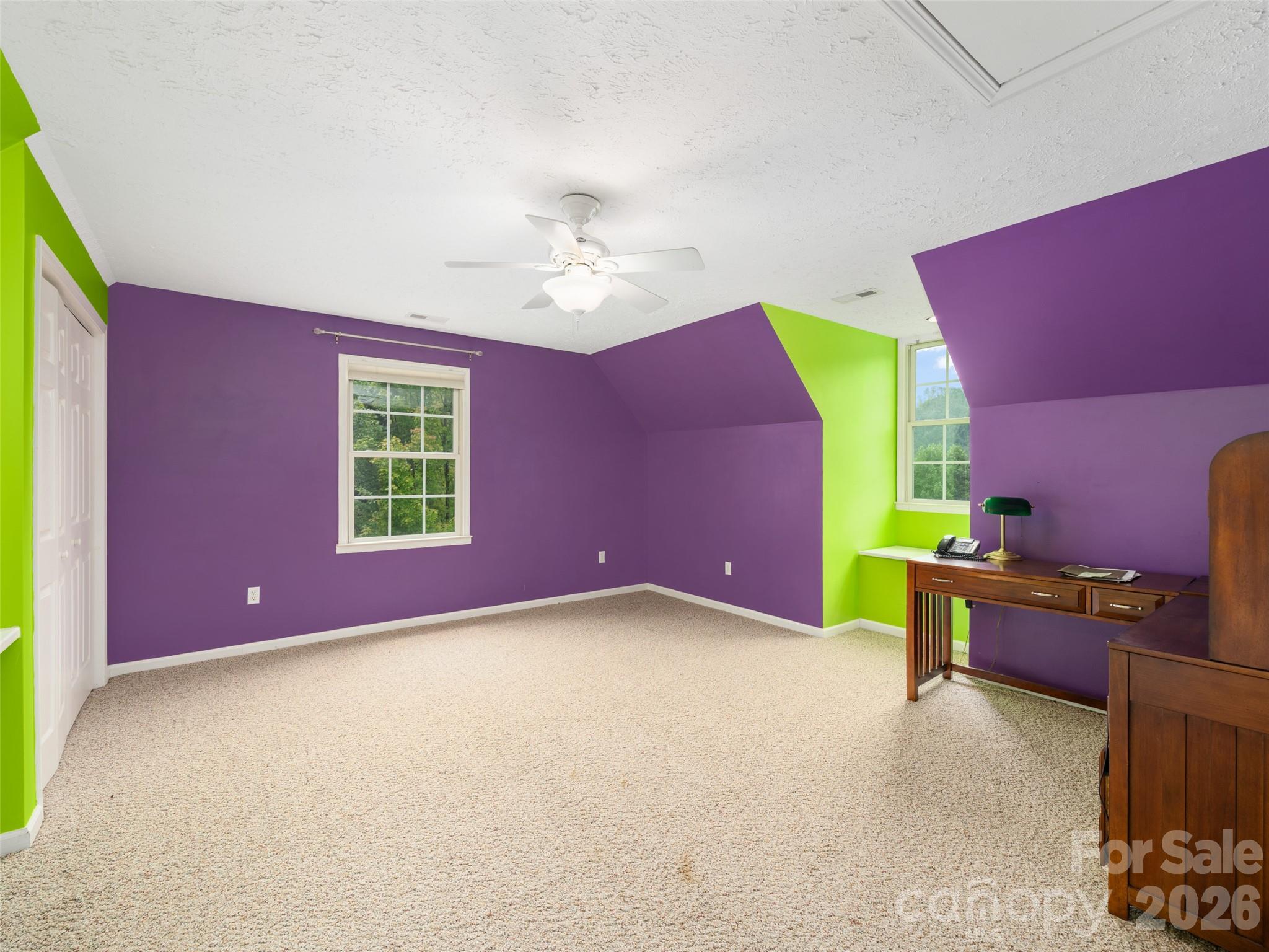 2216 Beans Creek Road Bakersville, NC 28705 - Photo 26 of 39 a view of a livingroom with a workspace