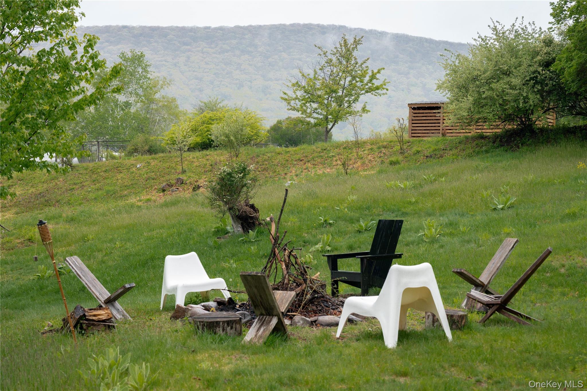 22 Mc Guffey Road Kerhonkson, NY 12446 - Photo 23 of 24 a view of a chair and table on the garden
