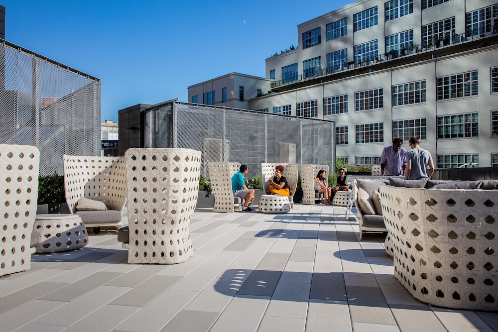 44-28 Purves Street, Unit 19B Queens, NY 11101 - Photo 13 of 19 a building outdoor space with patio furniture