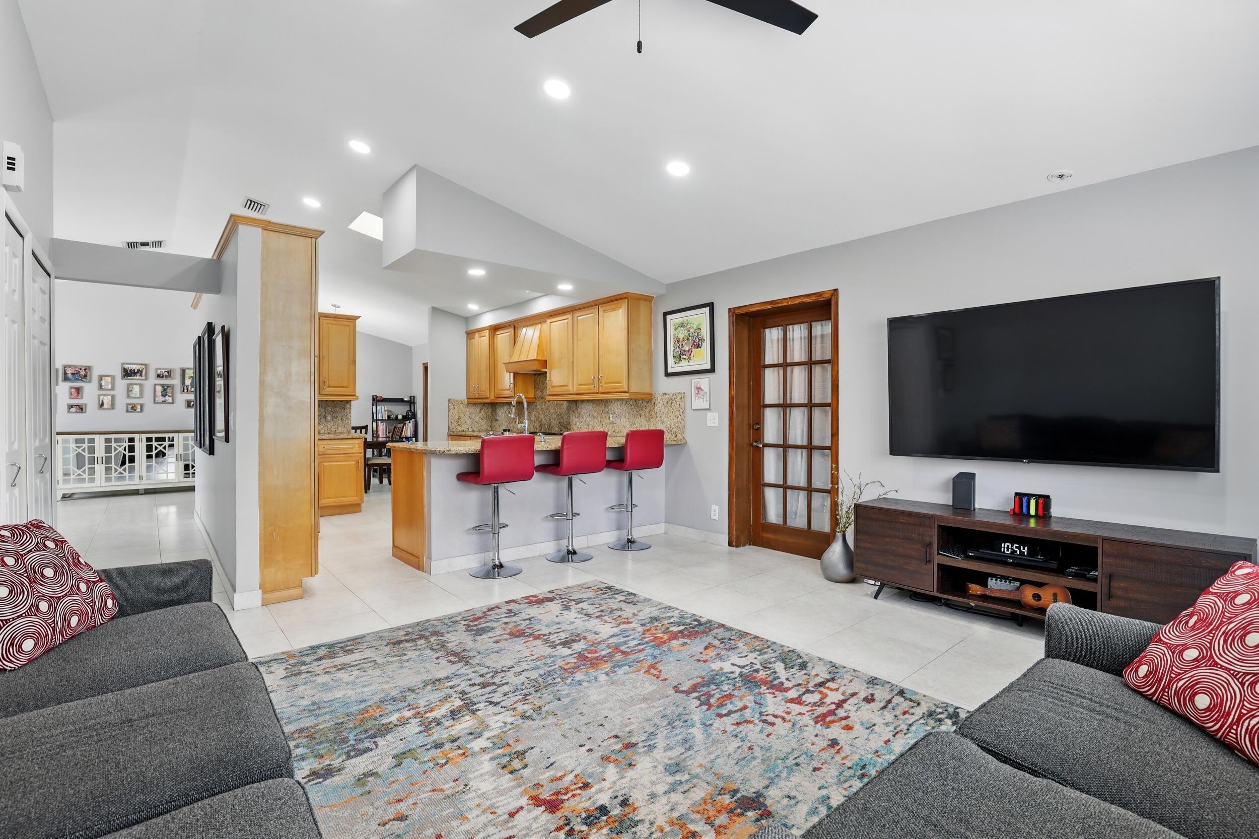 5183 Beechwood Road Delray Beach, FL 33484 - Photo 12 of 48 Living Room Overlooking Kitchen