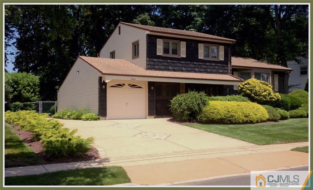 7 Gramercy Road Old Bridge, NJ 08857 - Photo 24 of 24 a front view of a house with a yard