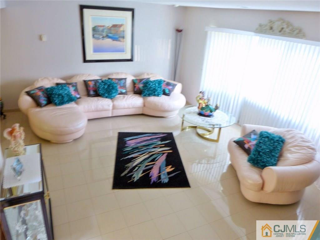7 Gramercy Road Old Bridge, NJ 08857 - Photo 5 of 24 a living room with furniture and a large window