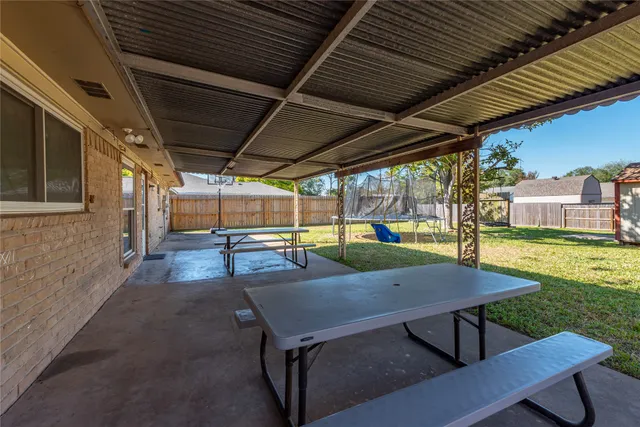 front view of a house with a patio