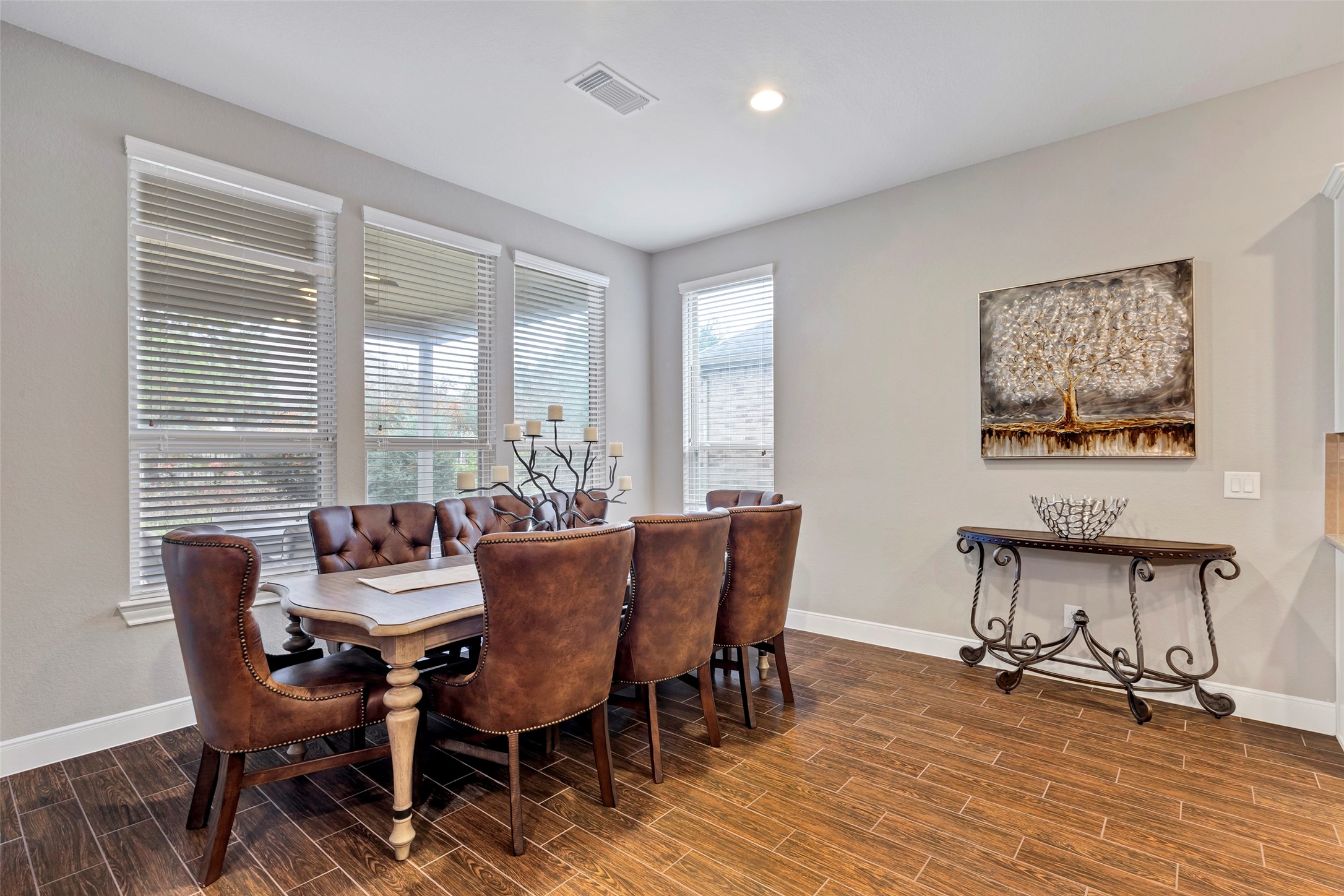 342 Kerry Bog Lane Spring, TX 77382 - Photo 12 of 39 a view of a dining room with furniture and wooden floor