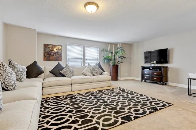 a bedroom with two beds and painted walls