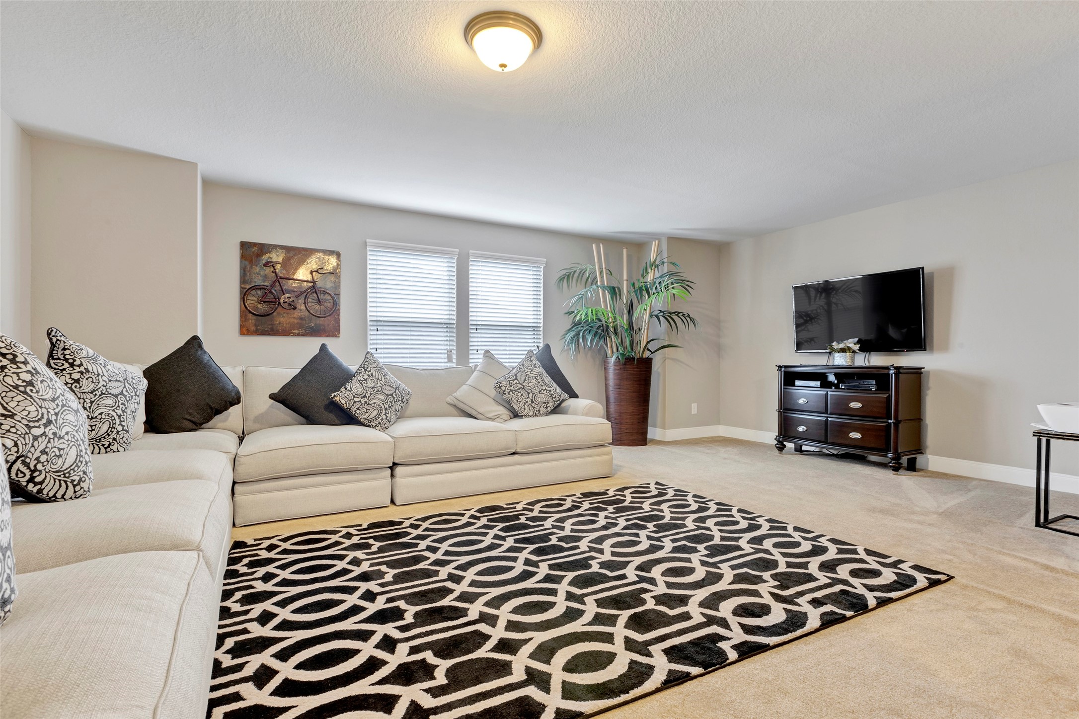 342 Kerry Bog Lane Spring, TX 77382 - Photo 28 of 39 a living room with furniture and a flat screen tv