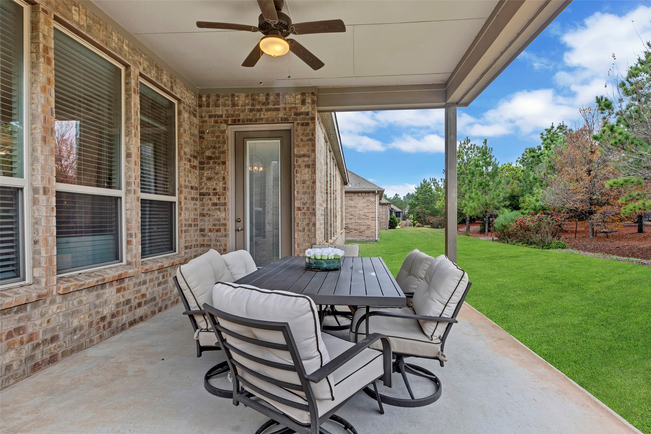 342 Kerry Bog Lane Spring, TX 77382 - Photo 36 of 39 a patio with couple of chairs and a table