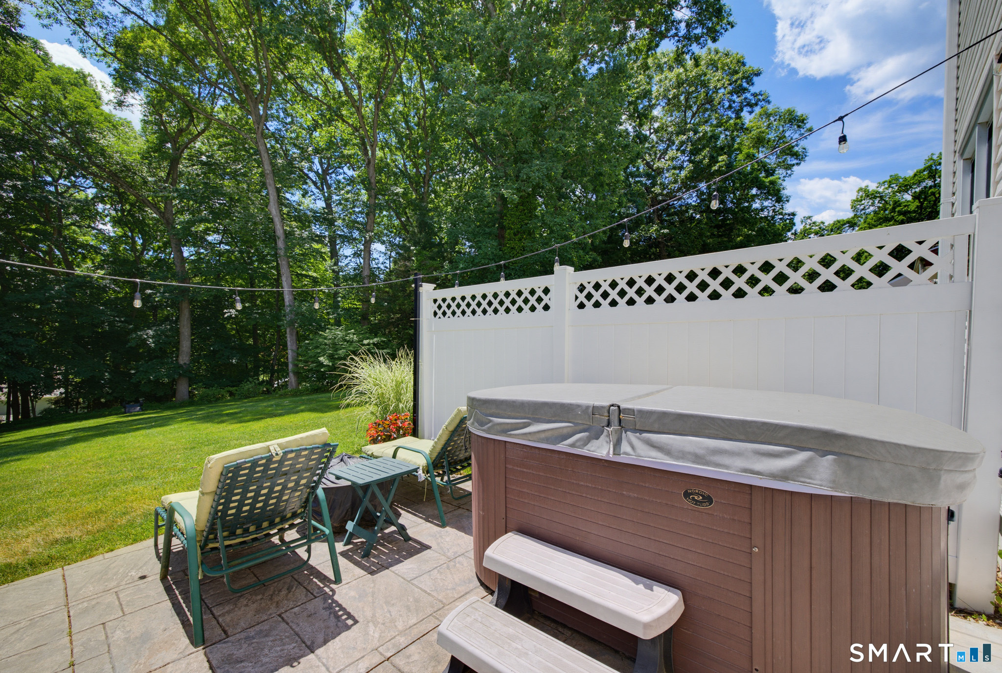 224 Spring Street Manchester, CT 06040 - Photo 32 of 39 a backyard of a house with table and chairs