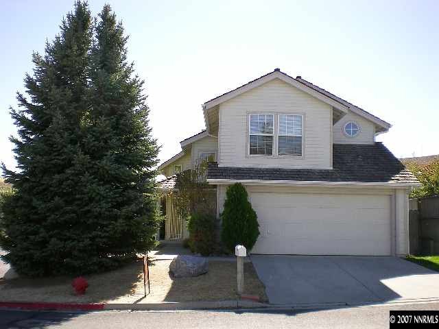 2910 Alpine Creek Road Reno, NV 89519 - Photo 1 of 9 a front view of a house with garden