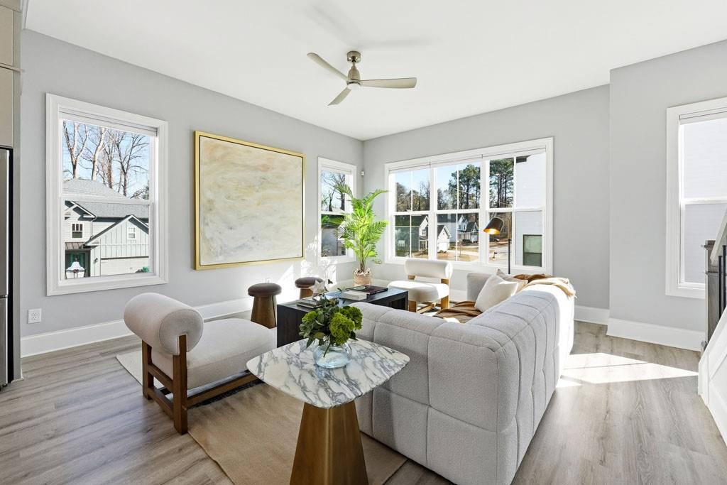1363 Pavilion Street Southeast, Unit 44 Atlanta, GA 30316 - Photo 8 of 28 a living room with furniture and a large window