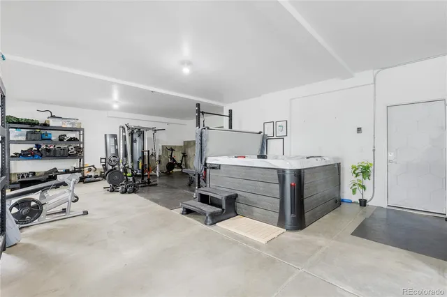 a utility room with sink dryer and washer