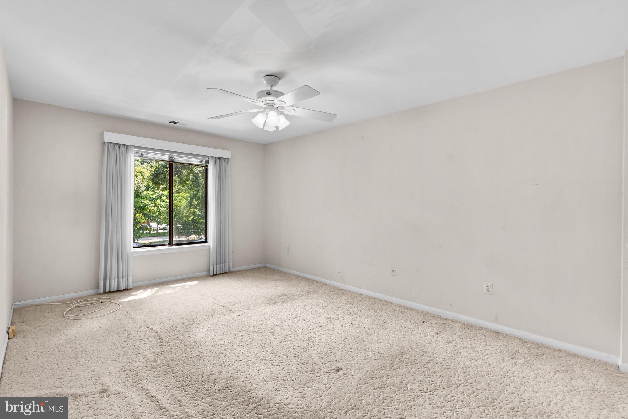 6300 Red Cedar Place, Unit 310 Baltimore, MD 21209 - Photo 15 of 28 an empty room with a window