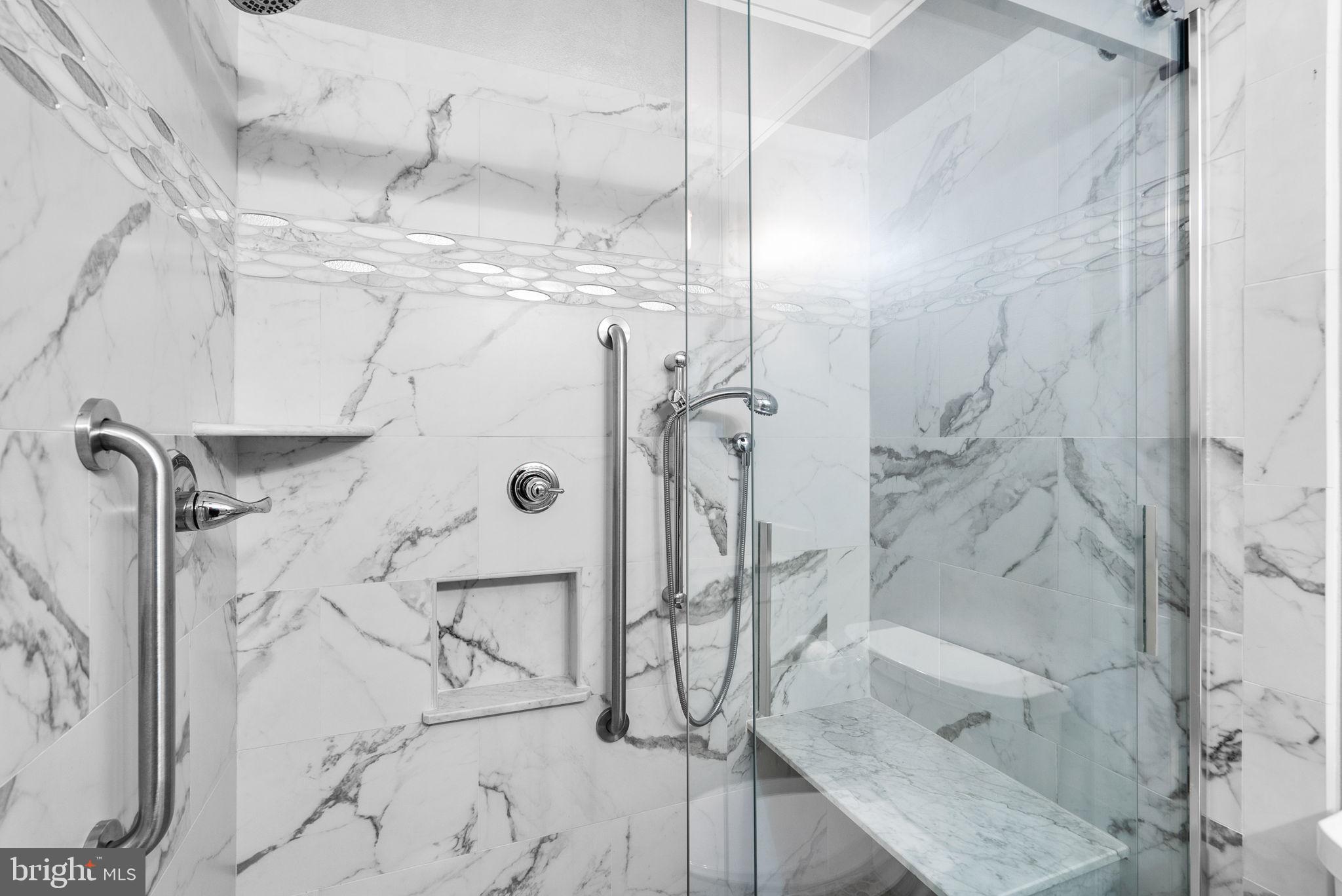 6300 Red Cedar Place, Unit 310 Baltimore, MD 21209 - Photo 24 of 28 a bathroom with a shower