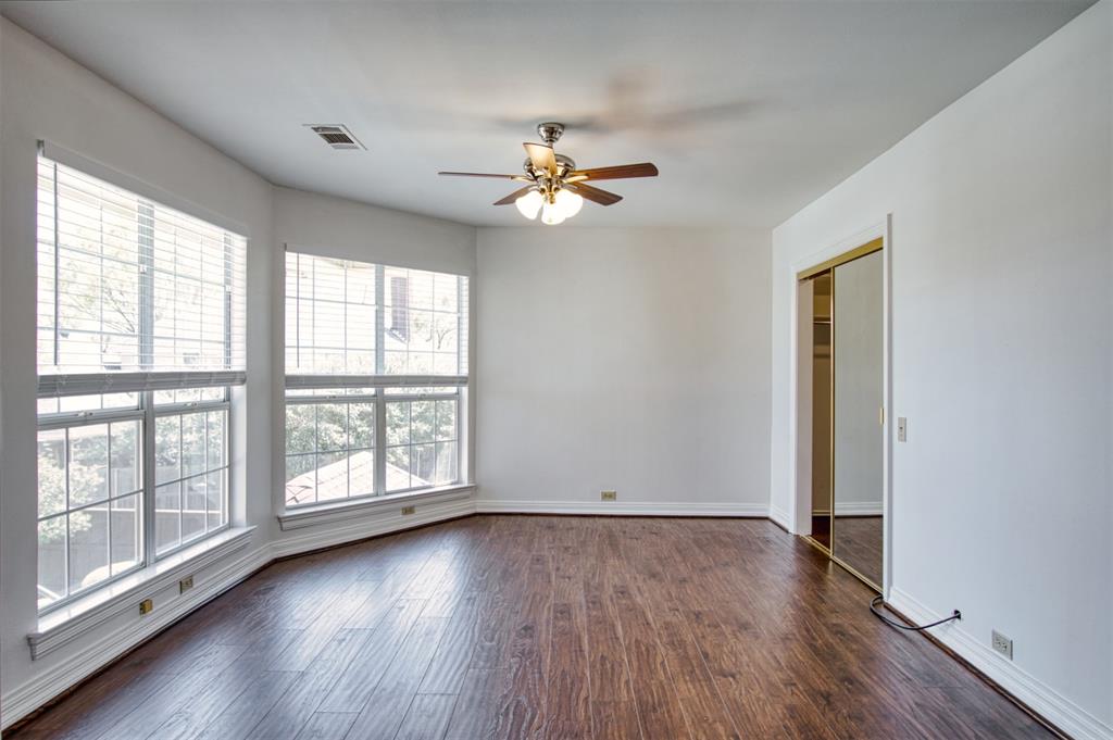 4564 Hitching Post Lane Plano, TX 75024 - Photo 29 of 40 wooden floor in an empty room with a window