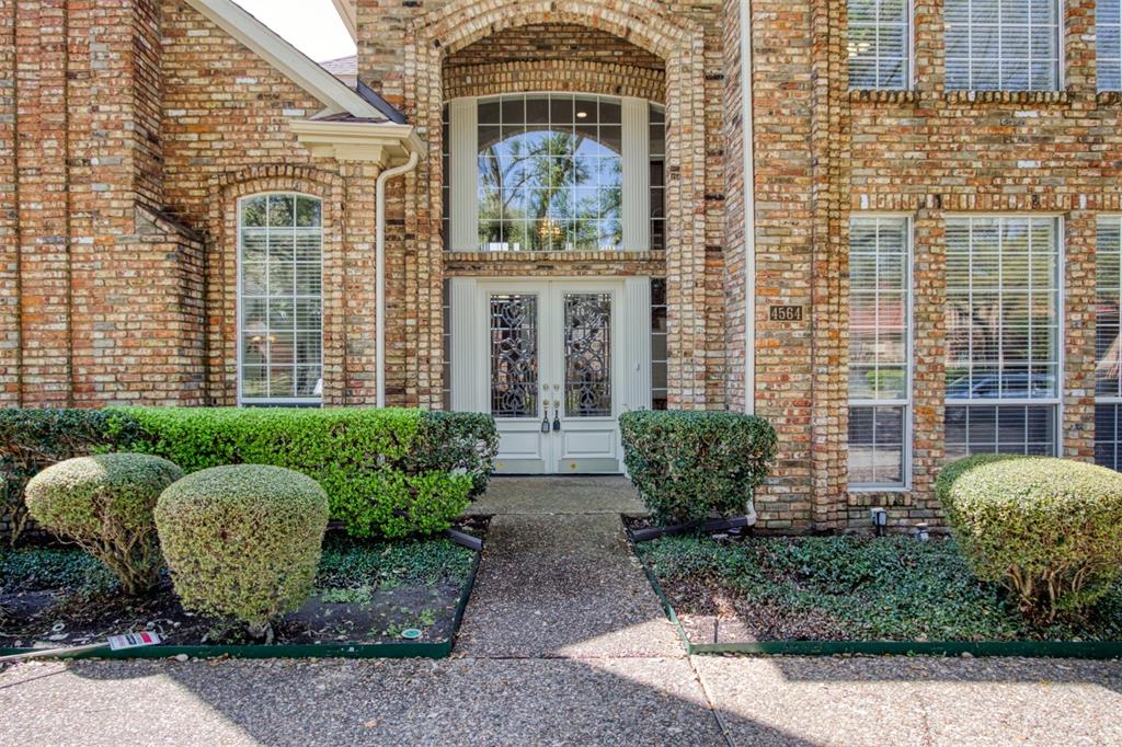 4564 Hitching Post Lane Plano, TX 75024 - Photo 3 of 40 a front view of a house
