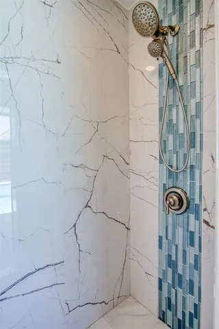 a view of a balcony with wooden floor