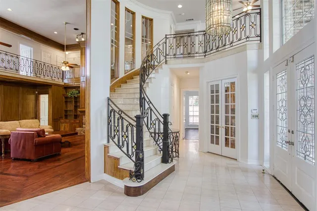 a view of entryway livingroom and hall with wooden floor