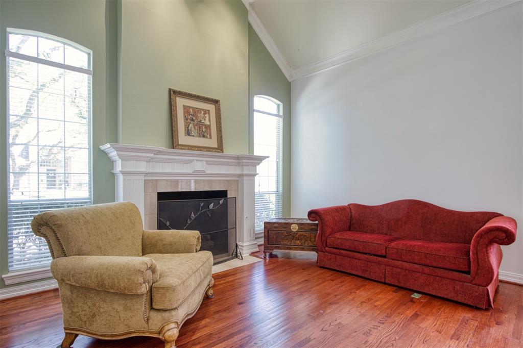 4564 Hitching Post Lane Plano, TX 75024 - Photo 6 of 40 a living room with furniture and a fireplace