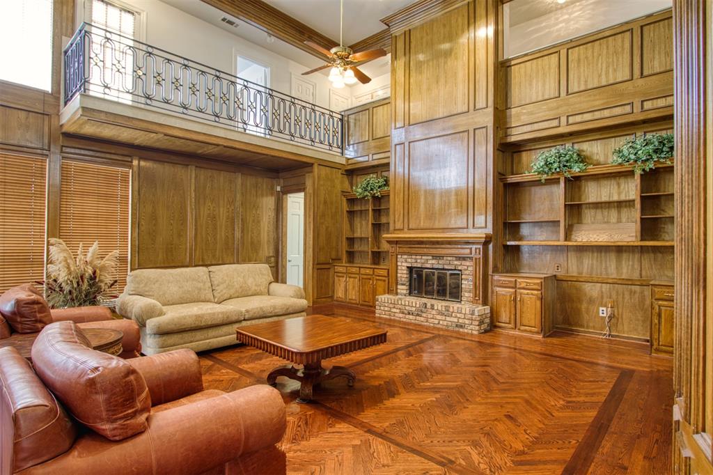 4564 Hitching Post Lane Plano, TX 75024 - Photo 9 of 40 a balcony with furniture and a window