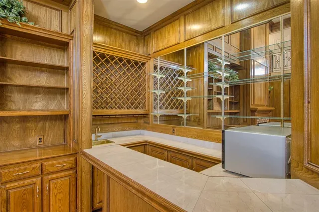 a bathroom with a tub and shower