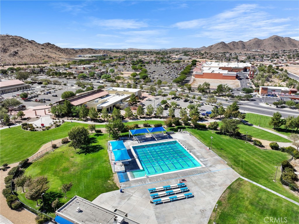 13341 Navajo Road Apple Valley, CA 92308 - Photo 12 of 16 an aerial view of multiple house with a yard