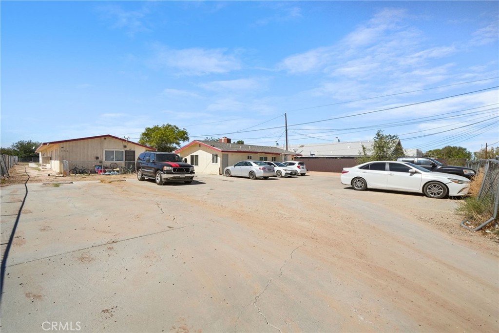 13341 Navajo Road Apple Valley, CA 92308 - Photo 8 of 16 a car parked on the side of the road