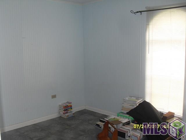 163 Sycamore Street Raceland, LA 70394 - Photo 4 of 11 Front bedroom