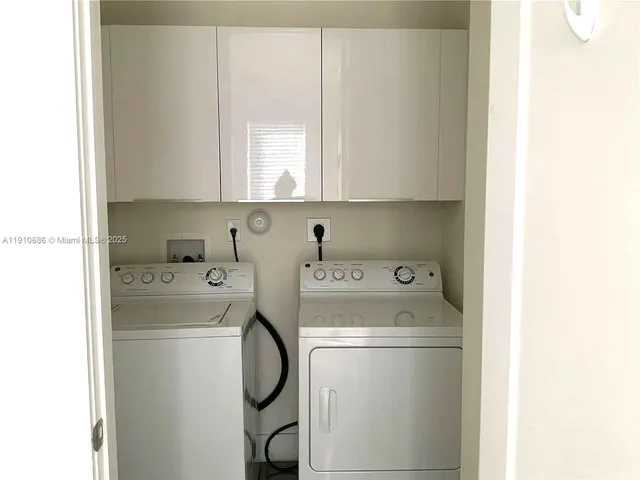 a view of a hallway with staircase